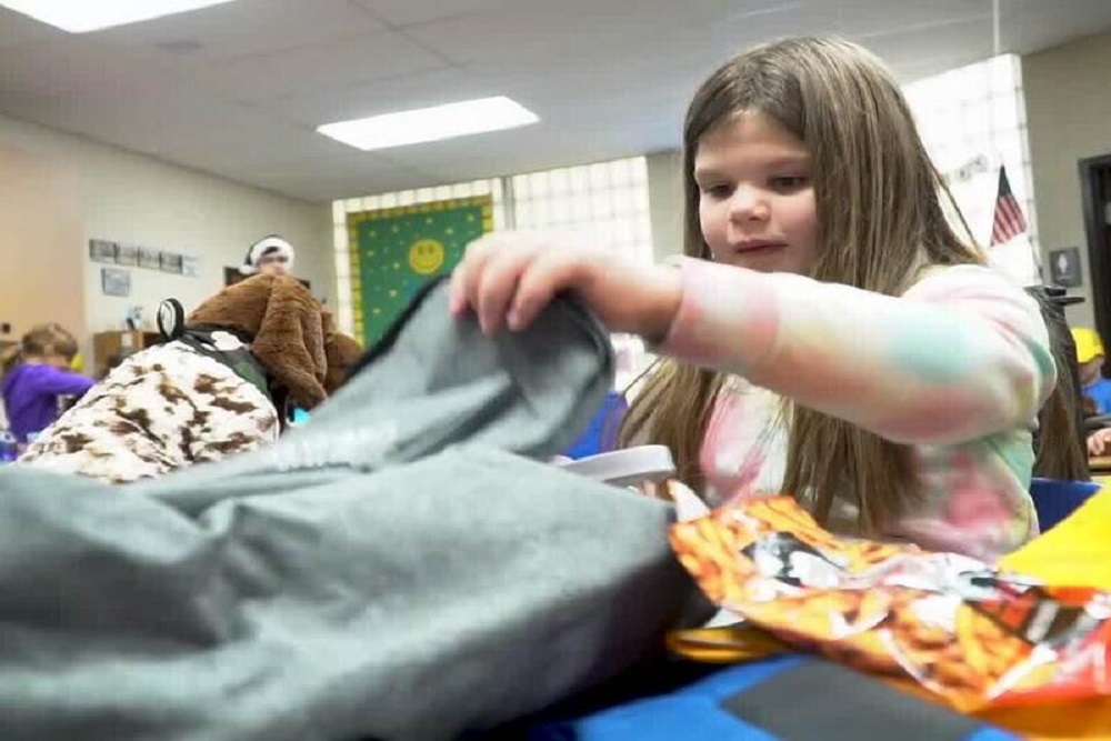 Sanford Cares program delivers backpacks to students
