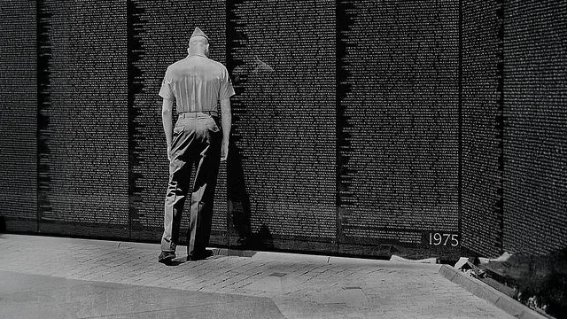 A U.S. Marine at Vietnam Veterans Memorial on July 4, 2002 A U.S. Marine at Vietnam Veterans Memorial on July 4, 2002