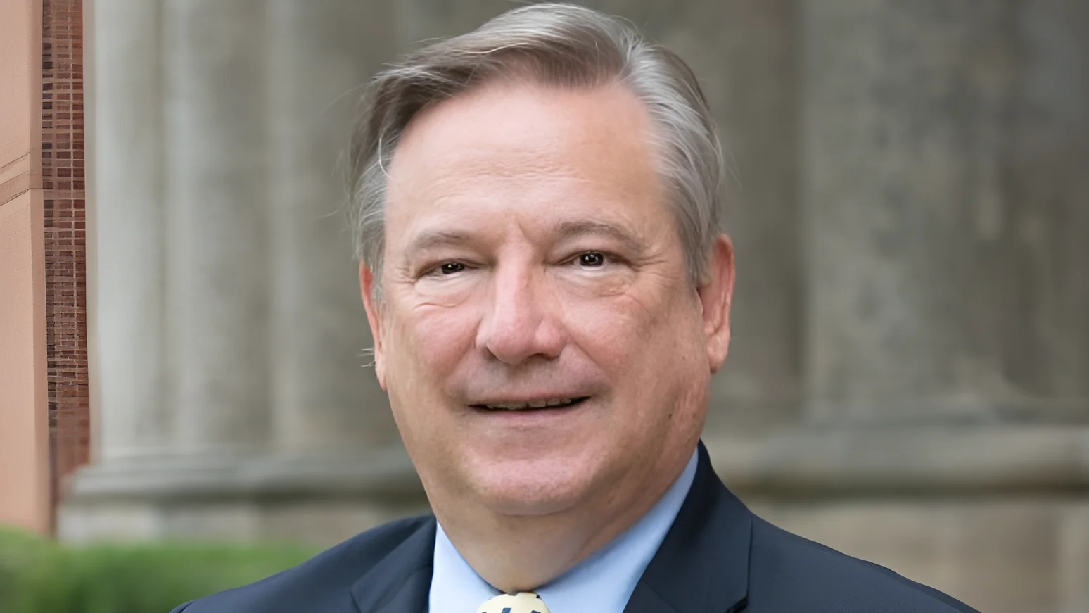 Christopher L. Holoman President