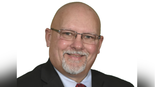 Assembly members serve pancakes highlighting New York maple syrup