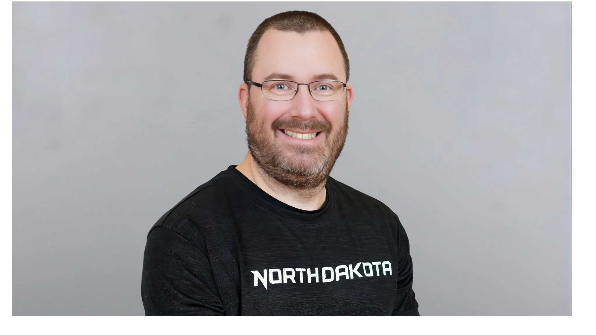 Dennis Hutter, Head Coach at North Dakota Fighting Hawks Women's Basketball