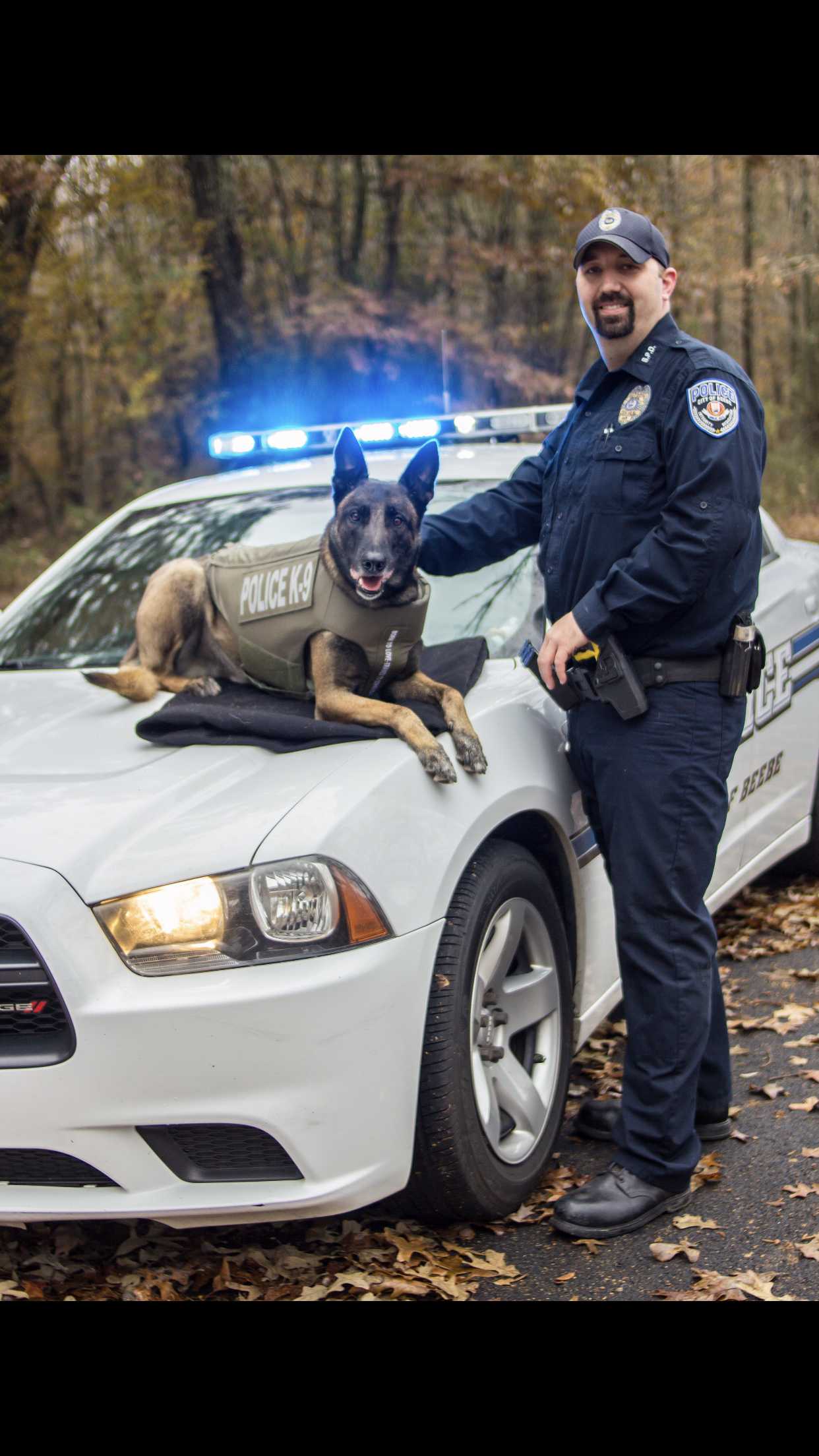 Officer Officer Blake Rogers with K-9 K9 Crank, a 9 year old Belgian Malinois Officer Officer Blake Rogers with K-9 K9 Crank, a 9 year old Belgian Malinois