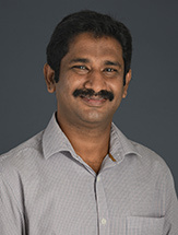 Rehabilitation science student celebrates rare award trifecta with his now-reunited family