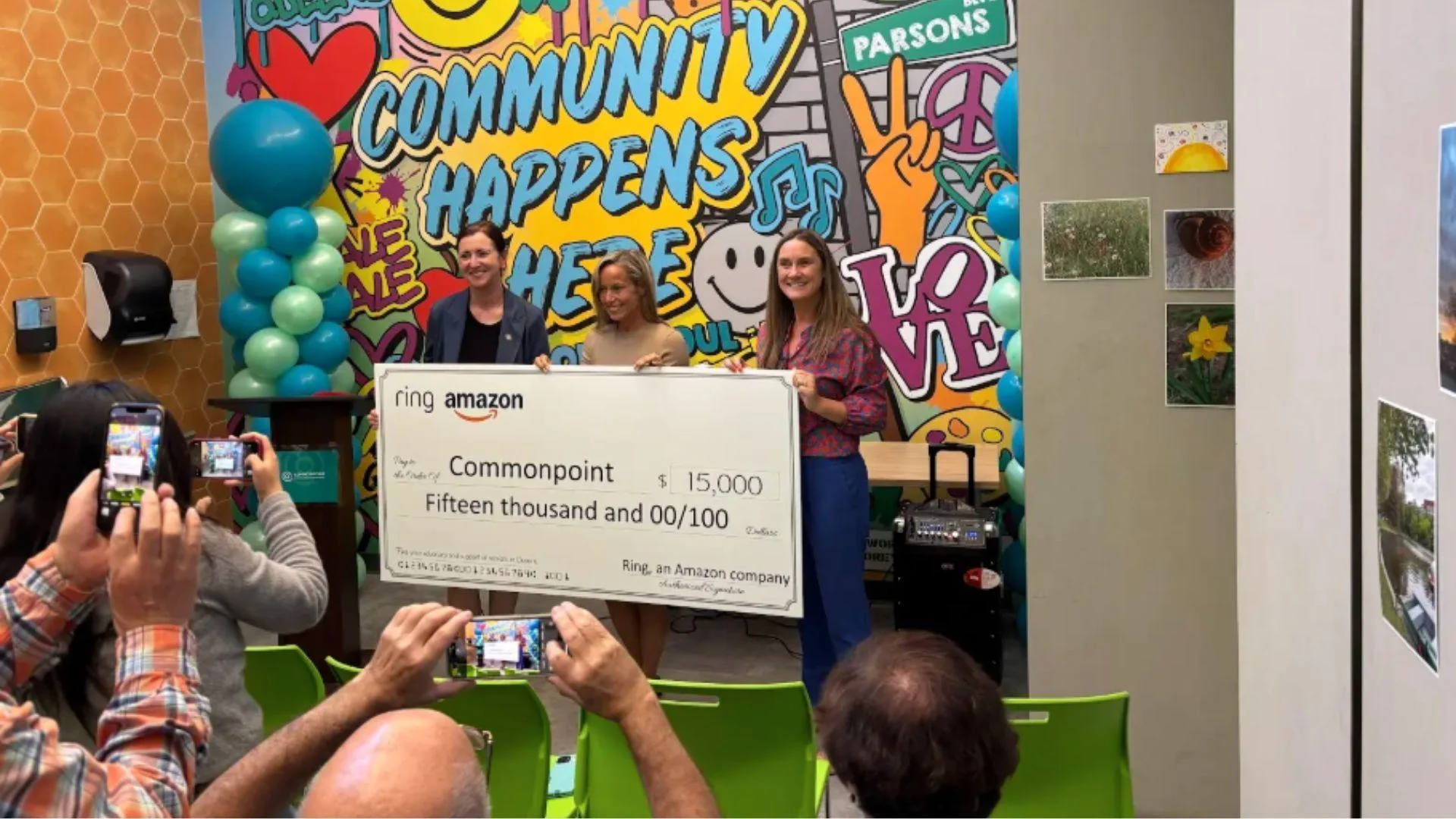 Danielle Ellman (center), Chief Executive Officer, Commonpoint, receiving a ,000 donation from Ring Danielle Ellman (center), Chief Executive Officer, Commonpoint, receiving a ,000 donation from Ring