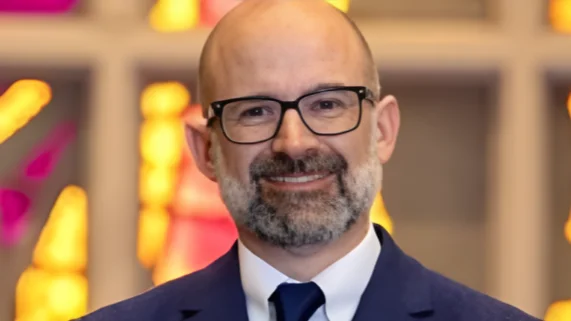 Dr. Russell P. Dawn, President