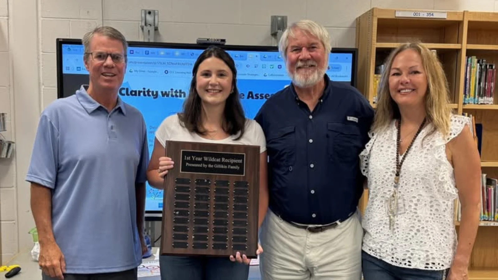 Ben Gillikin, Savannah Webb (recipient), Frank Gillikin, and Dr. Michala Cardwell (Principal of Windsor Woods) - VBSchools Facebook