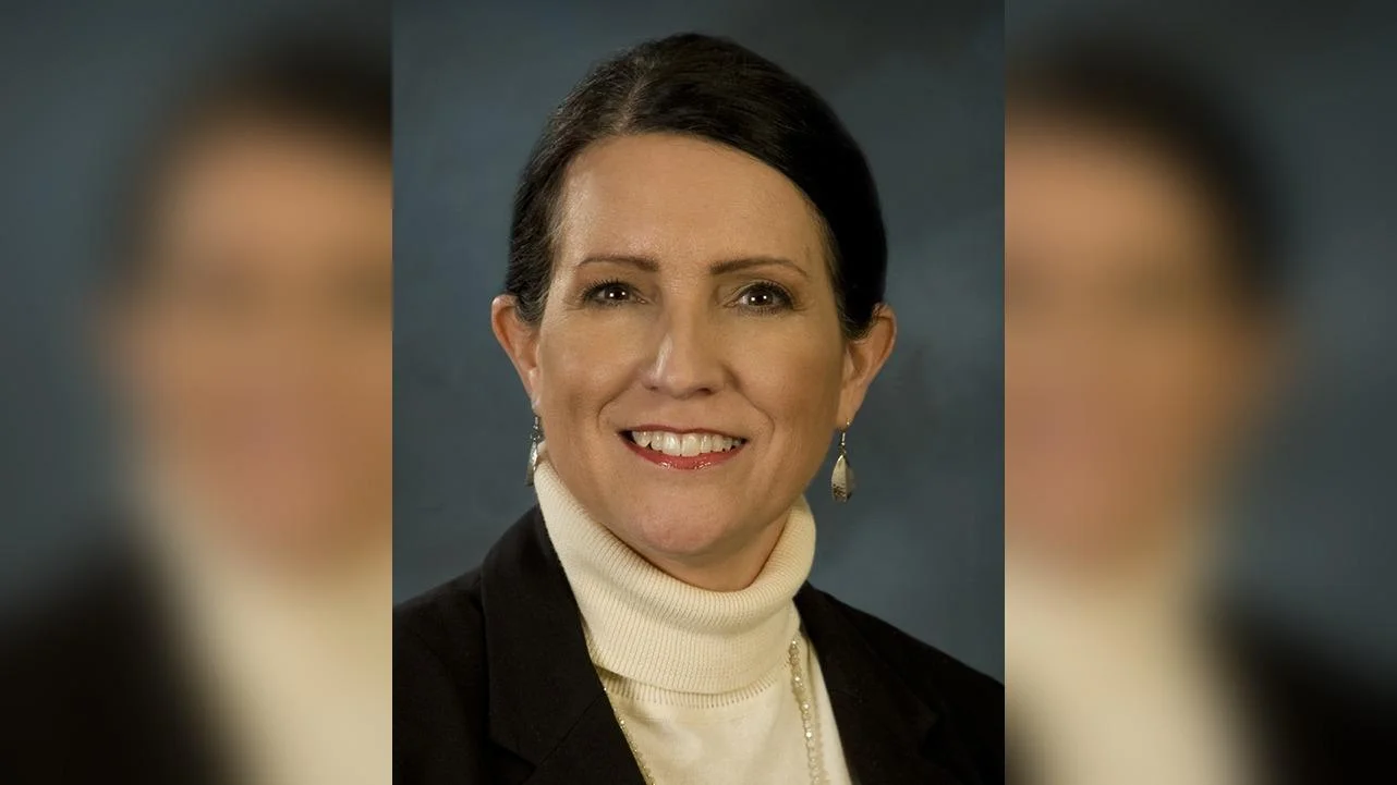 Angela P. Littrell President & Chief Executive Officer