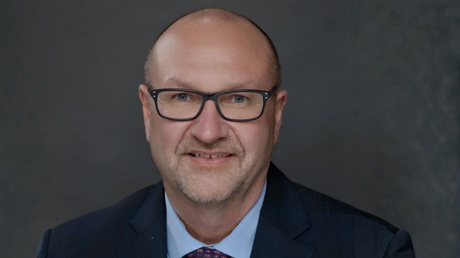 Dr. Allen Burgad, president