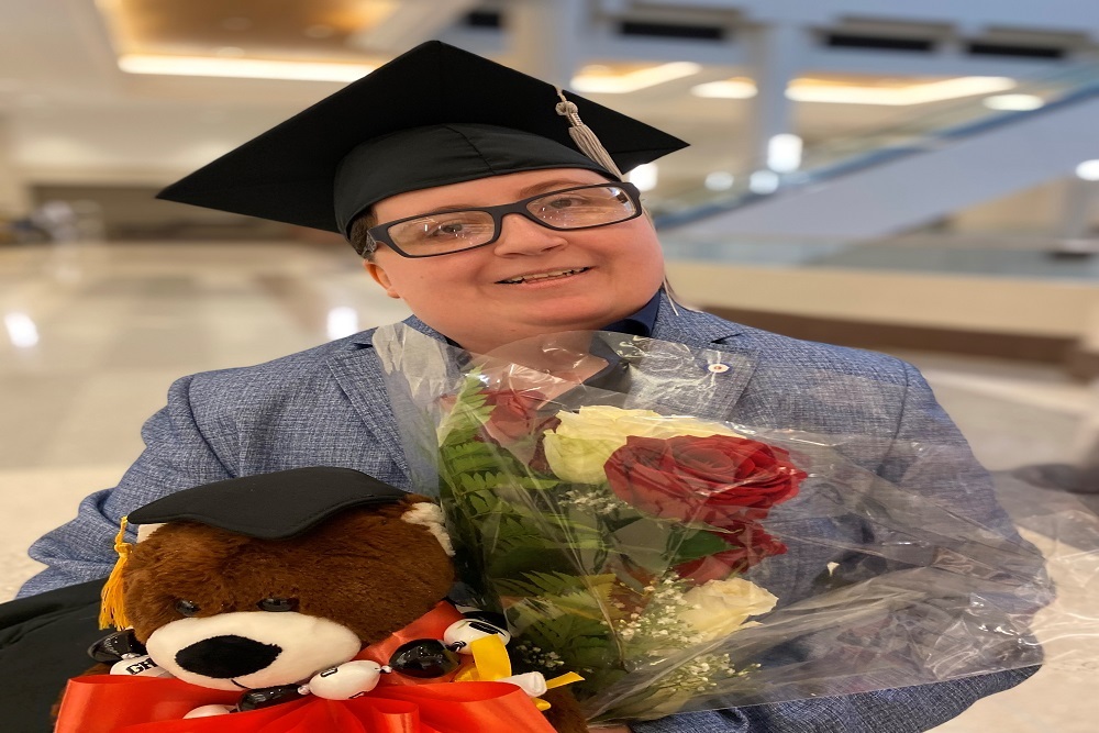 Grad Earns Degree After Eight Year Journey