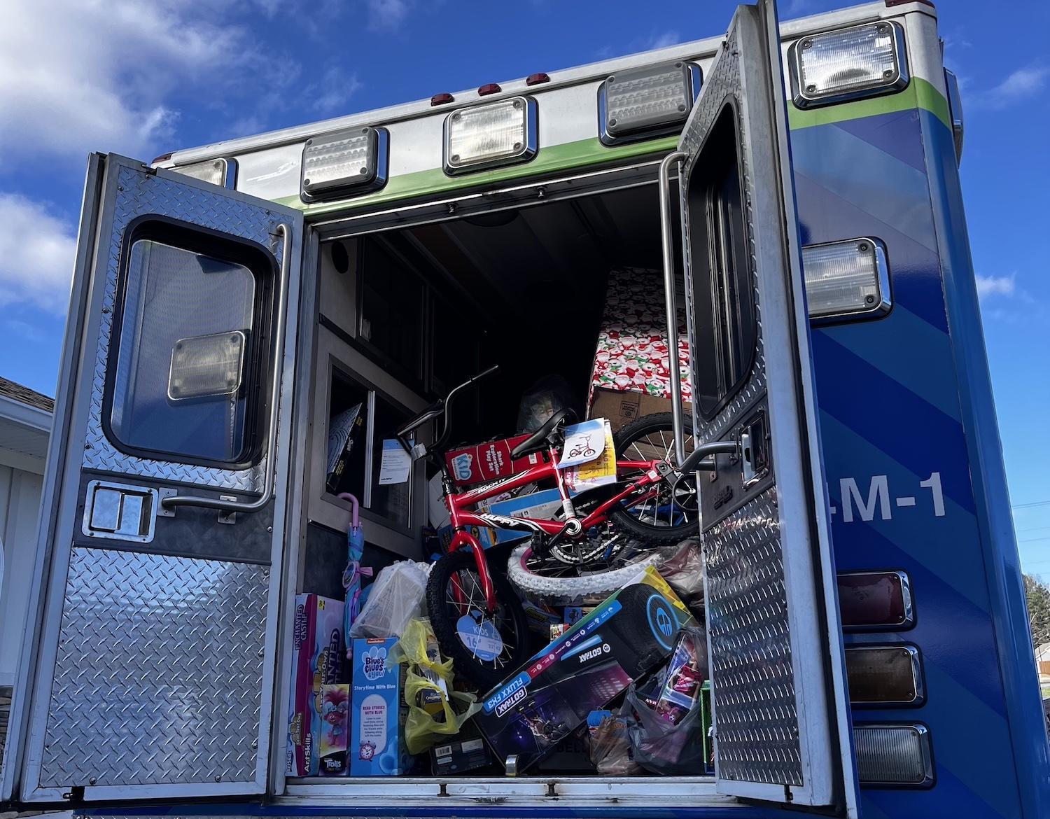 EMS Delivers Two Truckloads of Toys to Local Children
