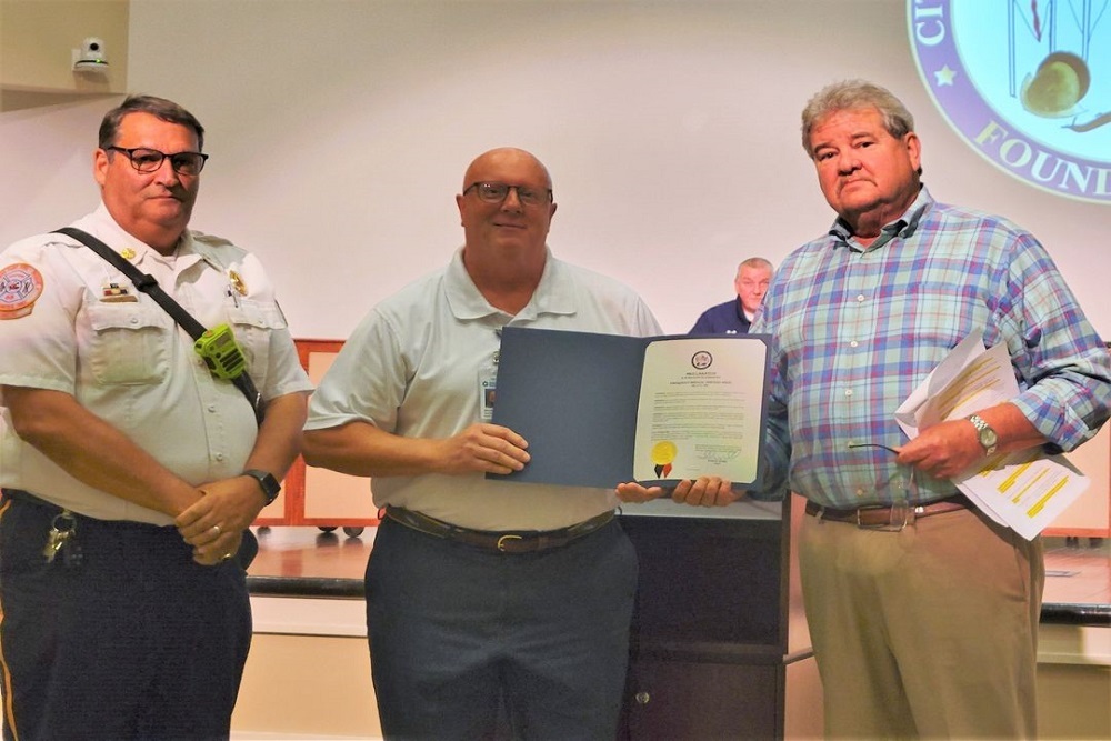 Mayor McMillan presented a proclamation to Lt. Heath Gilmore of Spanish Fort Police Department