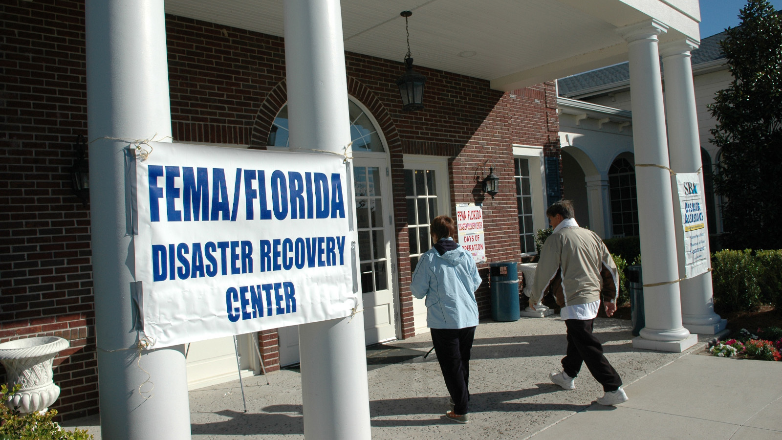 Property owners in The Villages are no strangers to flooding, as shown in this 2007 photo of residents entering a FEMA Disaster Recovery Center at the Laurel Manor Recreation Center. - FEMA