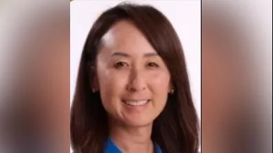 Alicia Um Holmes Head Coach