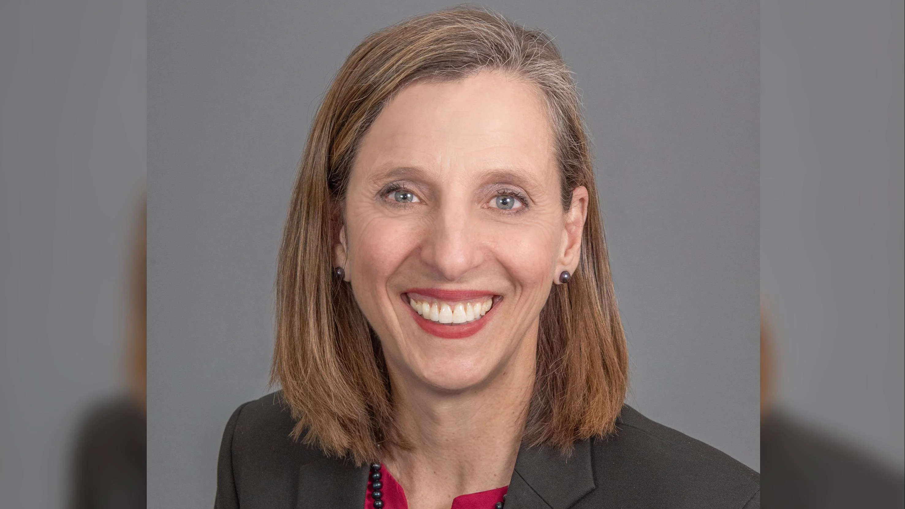 Lisa Charpilloz Hanson, Director