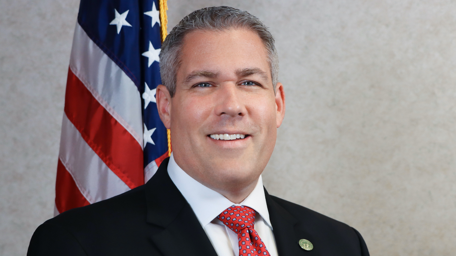 Adam J. Bello