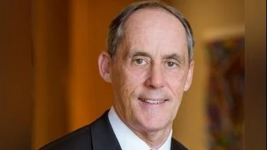 Thomas M. Priselac President and CEO