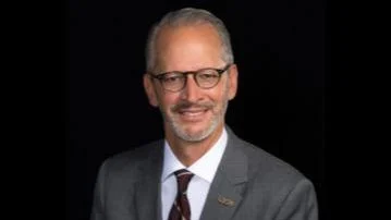 Dr. Troy D. Paino, President