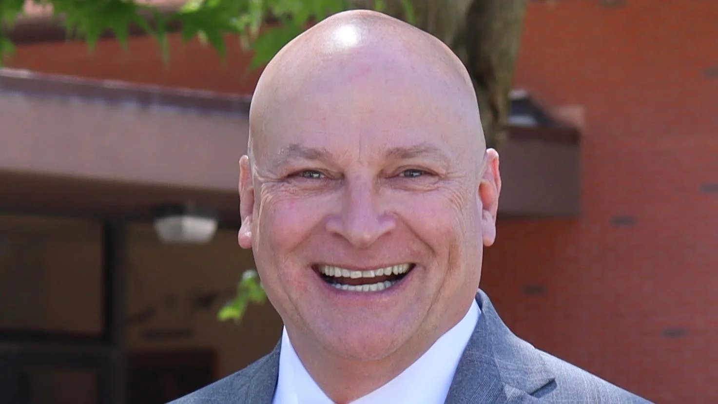 Michael J. Dumont Interim President