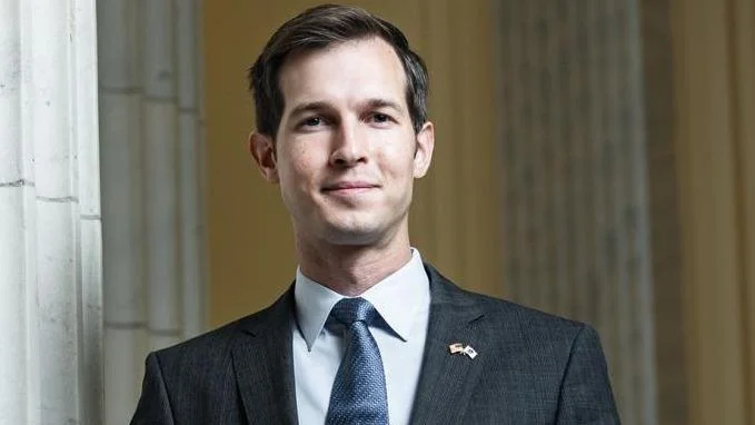 Jake Auchincloss addresses vaccine debate and cybersecurity threats in recent tweets