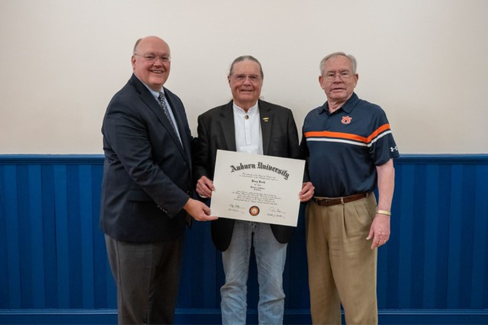 Living the Creed: Dr. Barry Booth’s lifetime of service commemorated with Auburn surprise