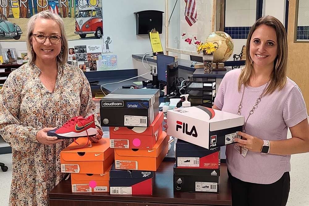 Singing River Academy Counselors Kimberly Montgomery and Emily Salter Received a Donation of New Athletic Shoes and Socks for SRA Students