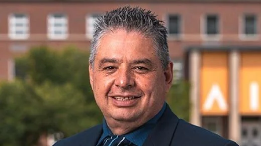 Hubert Benitez, DDS, PhD President - American International College