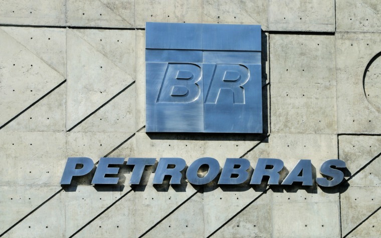 Petrobras cuts investments, expenses after plunge in crude oil prices