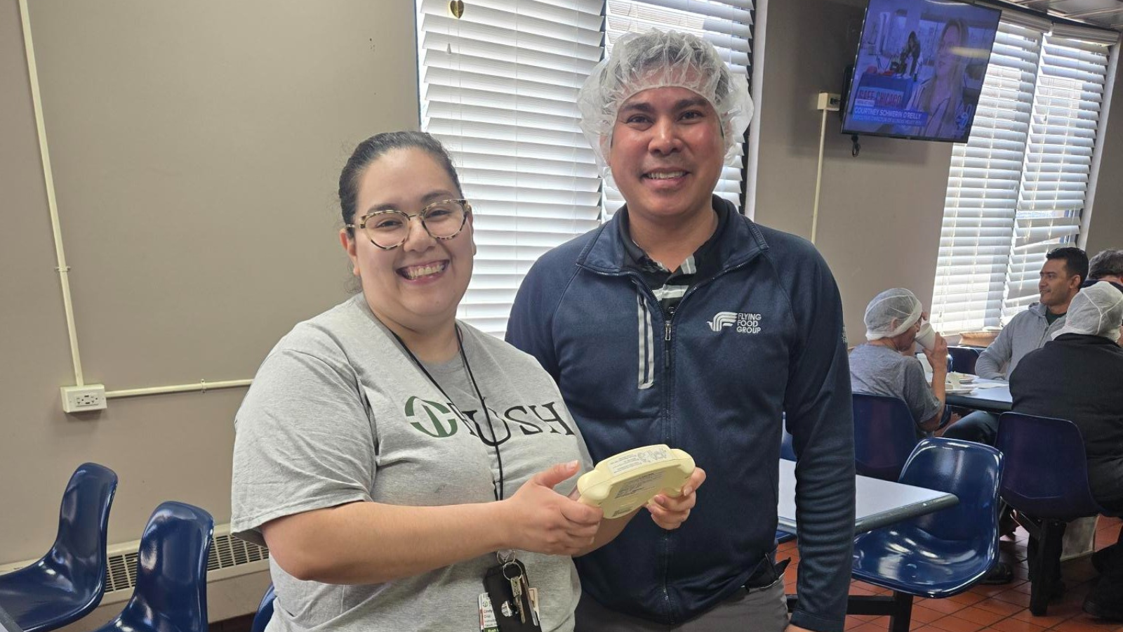 FFG Employee with Rush Medical staff at event