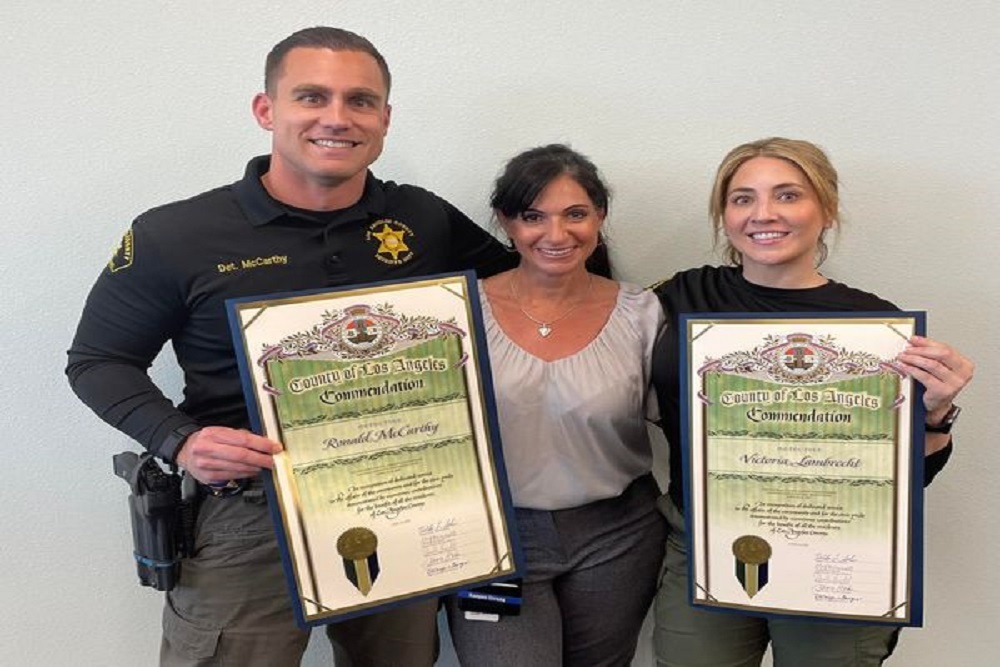 Detective McCarthy and Detective Lambrecht