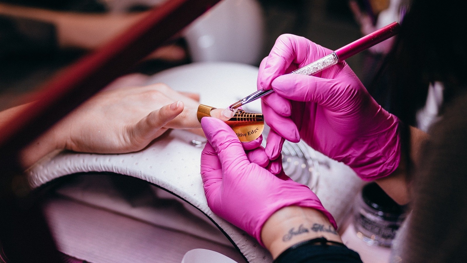 As part of her safety system, owner of Finishing Touch Day Spa Amy Camillo-Poland has created separate waiting rooms for nails and hair. As part of her safety system, owner of Finishing Touch Day Spa Amy Camillo-Poland has created separate waiting rooms for nails and hair.