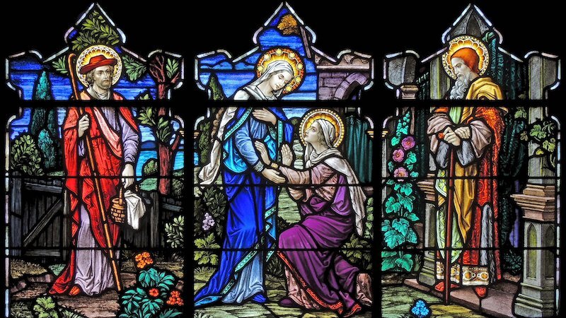 A stained-glass window depicts an artist's interpretation of the Visitation. A stained-glass window depicts an artist's interpretation of the Visitation.