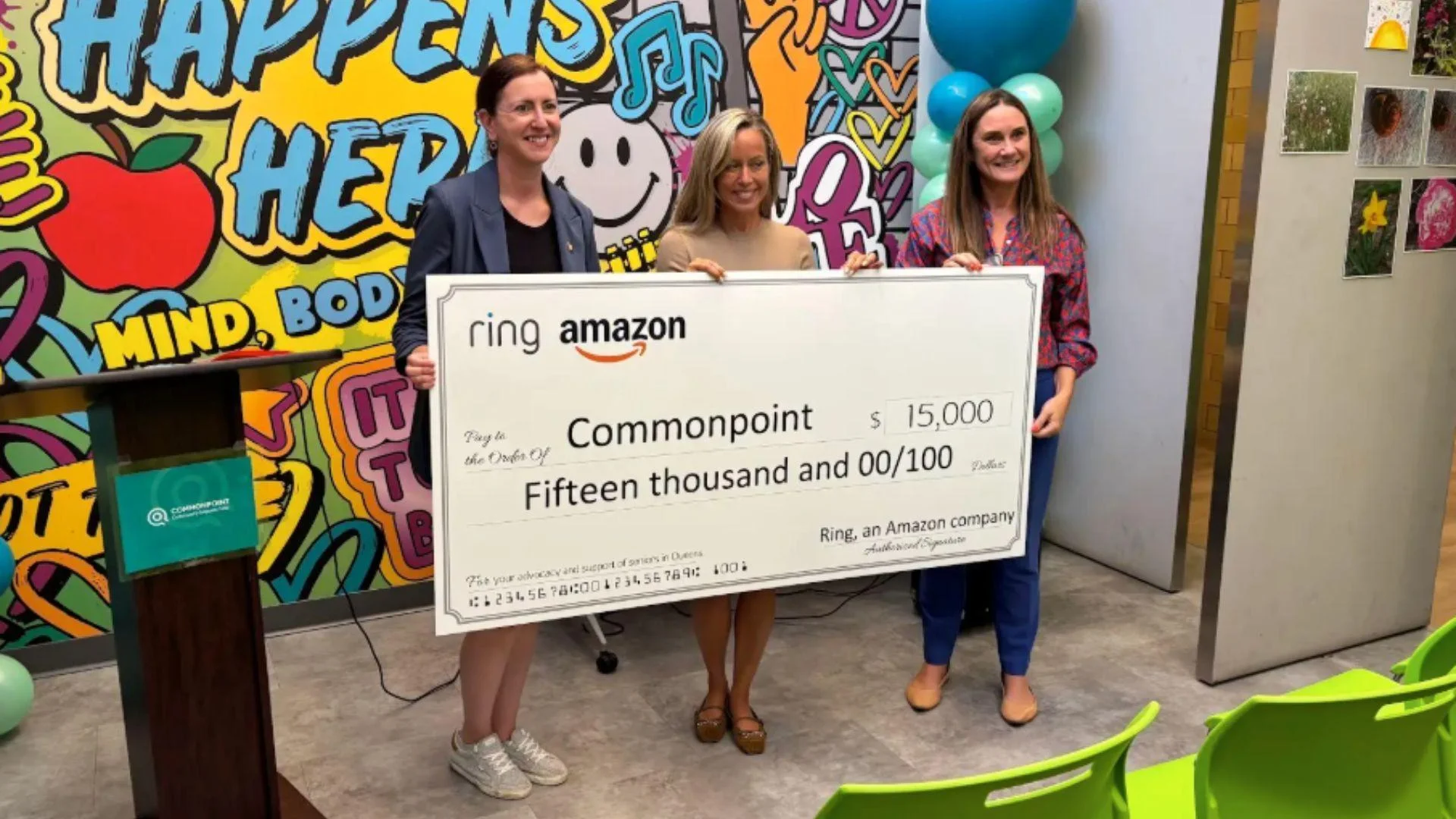 Danielle Ellman (center), Chief Executive Officer, Commonpoint, receiving a ,000 donation - Provided
