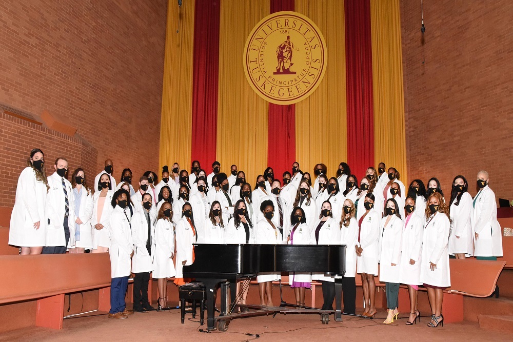 Tuskegee University College of Veterinary Medicine presents 58 white coats to students at 2022 ceremony Tuskegee University College of Veterinary Medicine presents 58 white coats to students at 2022 ceremony