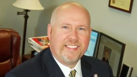 Dr. Chris Whaley, President