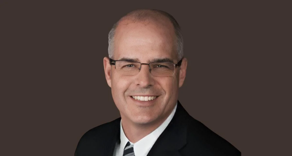 Dr. Mark Thompson, CEO