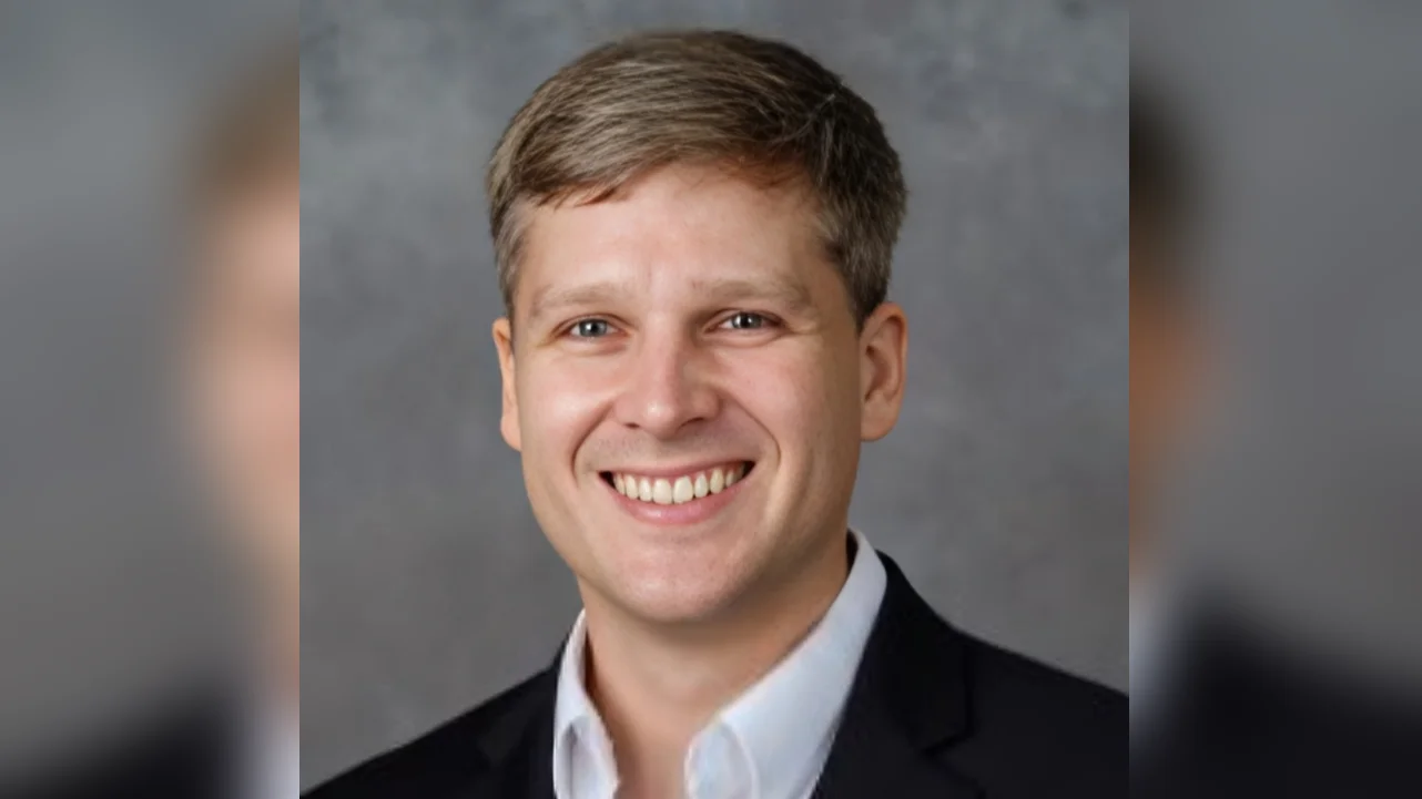 Mark Curtis Department Chair, Reynolds Professor of Economics and Associate Professor