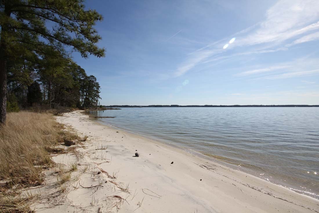 A white sand beach offers another spot to enjoy the water.