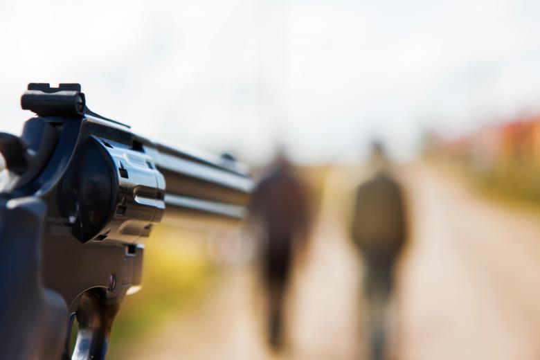 Armed Person Threatening