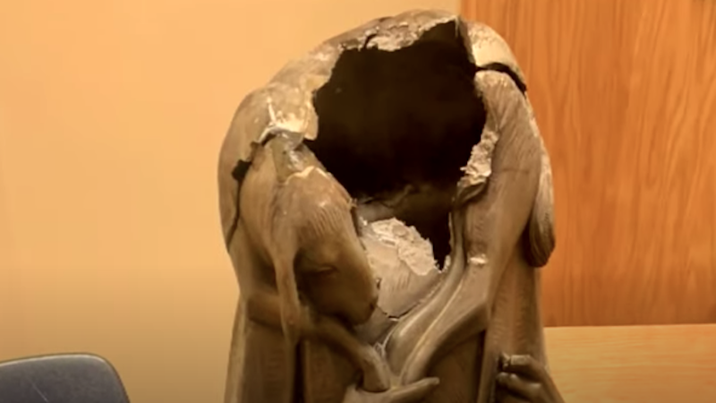A desecrated statue of the Virgin Mary in Miami earlier this month.