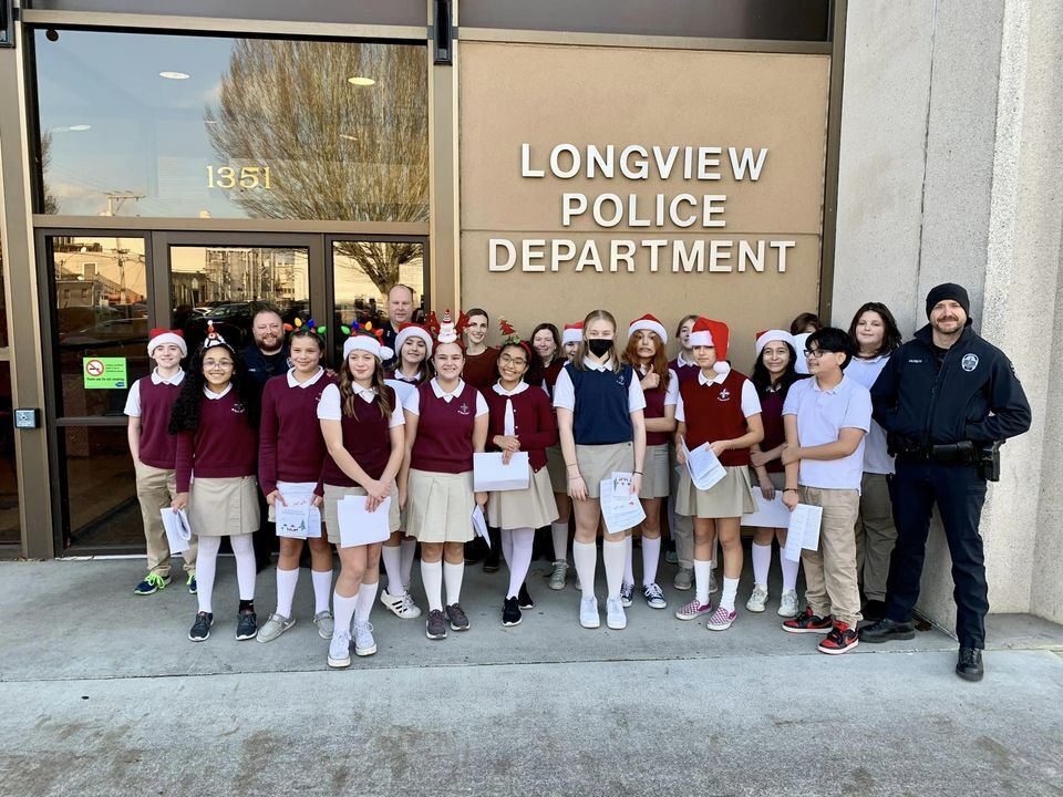 A group of carollers from the St. Rose School stopped by LPD to spread some Christmas cheer