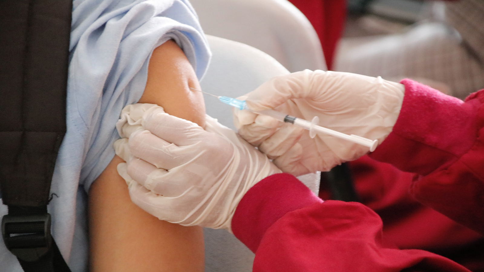 Larson urges people to get vaccinated amid ‘triple-demic’