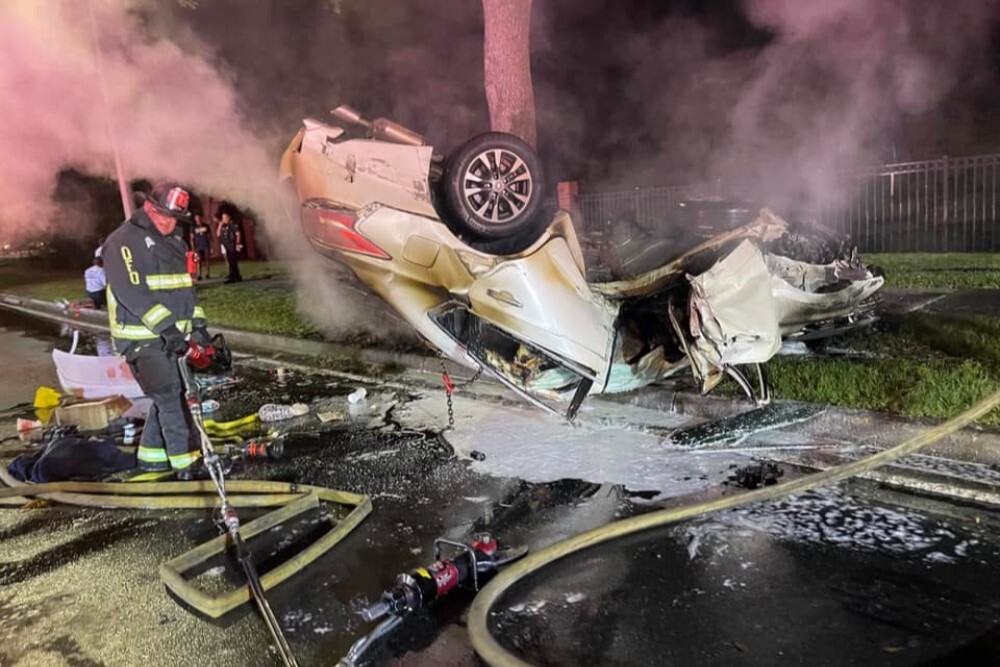 Woman Trapped Inside Of A Burning Overturned Vehicle Woman Trapped Inside Of A Burning Overturned Vehicle