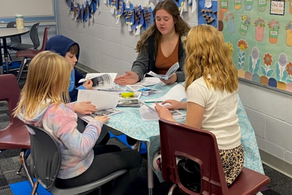 High School Tutors Assisting Elementary Students High School Tutors Assisting Elementary Students