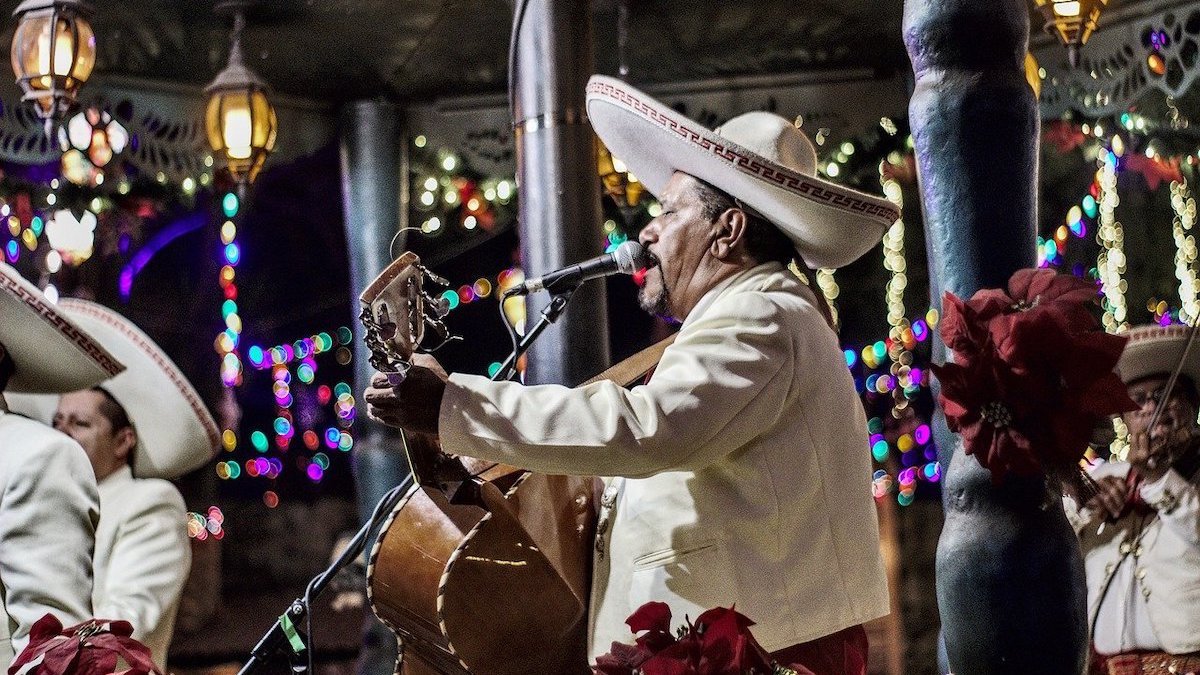 A student at St. Elizabeth University educates the local community about Latino culture and traditions.