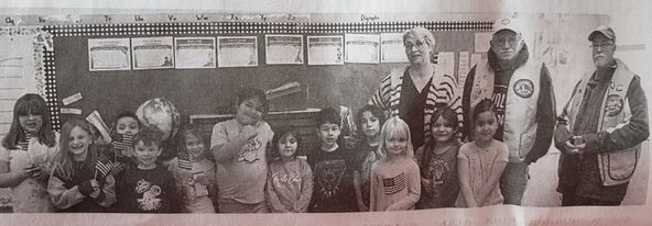 American Flags Handed Out to 1st Grade Classes in the Area