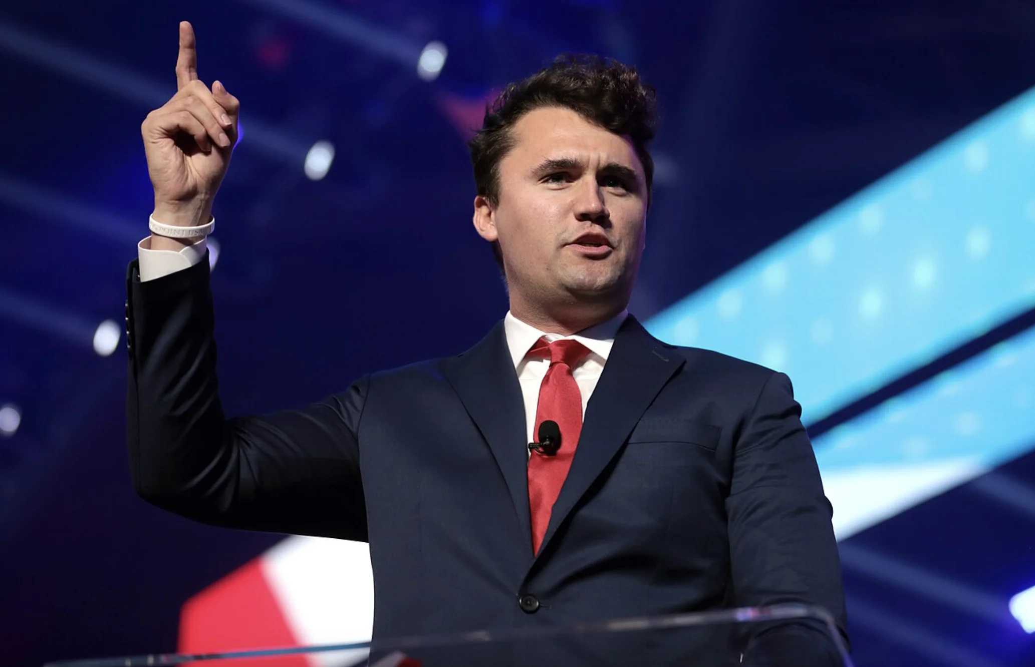 Charlie Kirk, who was tragically assassinated in 2025, is shown speaking with attendees at the 2021 AmericaFest held at the Phoenix Convention Center in Phoenix.