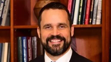 Michael J. Heindl, Ph. D., J.D. President