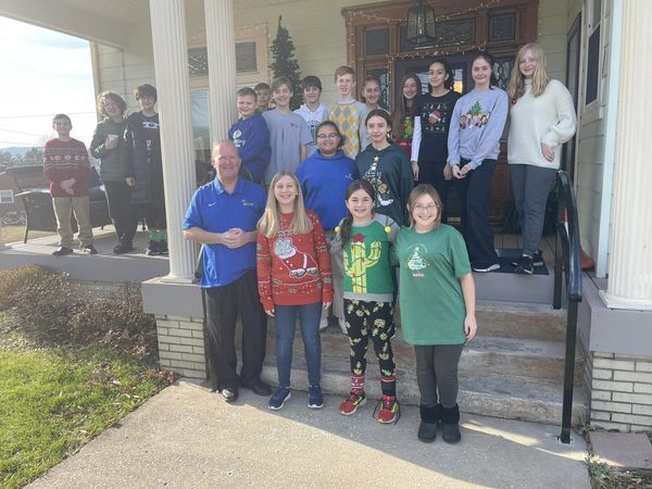 The seventh graders at St. Gregory had lunch with Father Jim today at the rectory