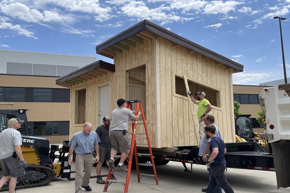 Raptor building constructed by JHS students transported to Jester Park