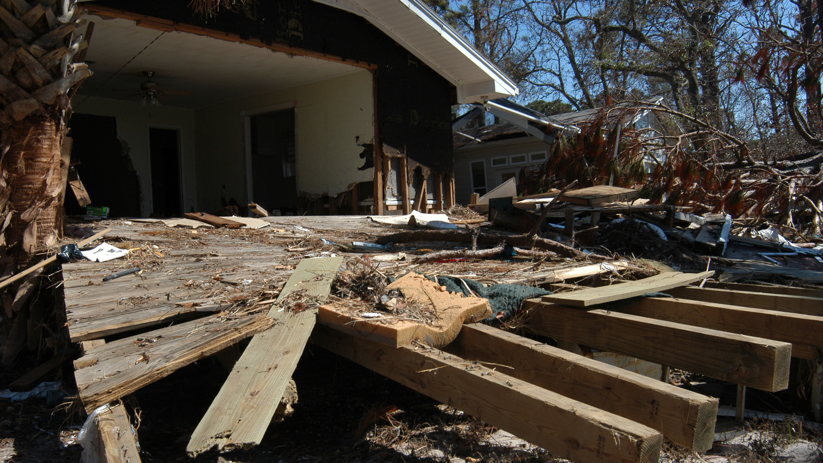 This Gulf Breeze, Fla., house was damaged by the estimated 10-foot storm surge of Hurricane Ivan. Insurance rates increase for homes in high-risk flood zones. - FEMA